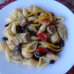 A picture of Tofette pasta with red beans & burger.