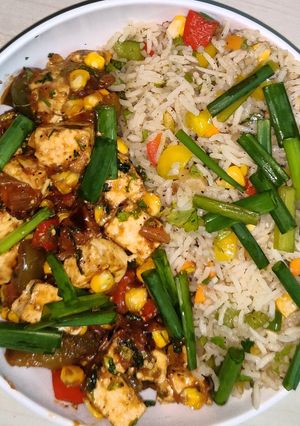 A picture of Ginger bell pepper rice with chilli paneer.