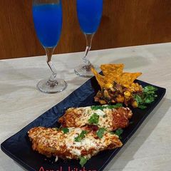 A picture of Veg enchiladas in pan.