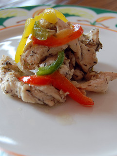 Una foto de Tiras de pollo a los tres pimientos