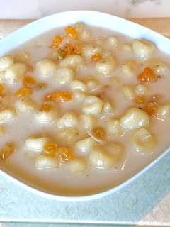 A picture of Dumpling in coconut sauce (mathobosha).