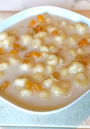 A picture of Dumpling in coconut sauce (mathobosha).