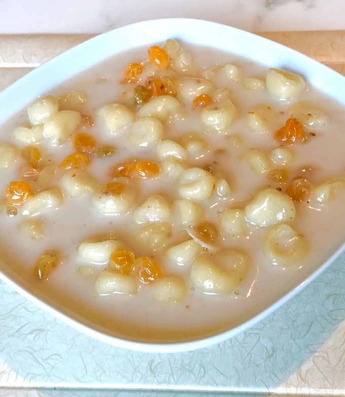 A picture of Dumpling in coconut sauce (mathobosha).
