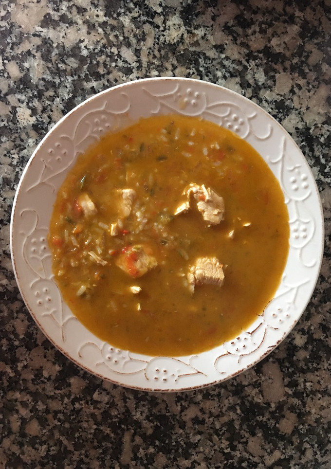 Una foto de Arroz caldoso con pollo