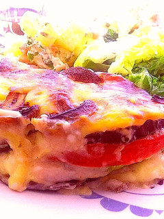 Una foto de Lasaña vegetariana (zapallitos, berenjena, tomate)