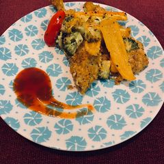 A picture of Grilled parmesan crusted chicken.