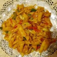 A picture of Tikka veggies pasta 🍝.