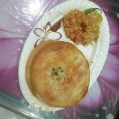 A picture of Matar and kulcha.