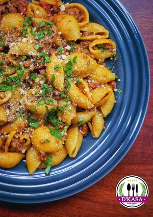 Una foto de Pasta Shells con Salsa Boloñesa Criolla