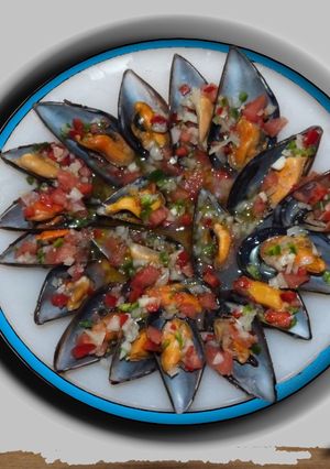 Una foto de Mejillones jardinera