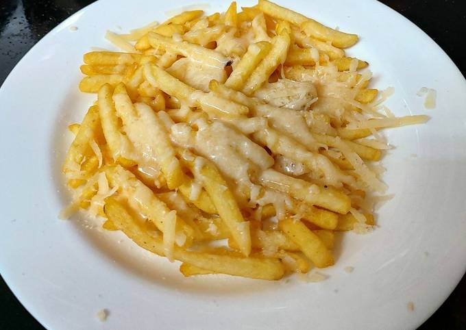 My Parmesan melted Cheese over French fries 😘