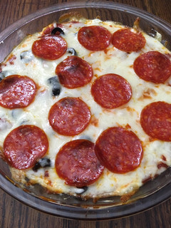 A picture of Pizza Dip with Toasted Garlic Baguettes.