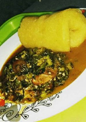A picture of Watery Okro soup garnished with prawn, pomo, stock fish and beef.