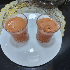 A picture of Carrot and orange juice.