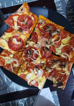 Una foto de Pizza 🍕🍕🍕