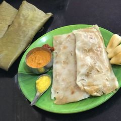 A picture of Jackfruit genasale / stuffed steamed duming.