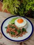 Stir-Fried Minced Beef with Basil and Fried Egg (Khao Pad Kra Pao Neua)