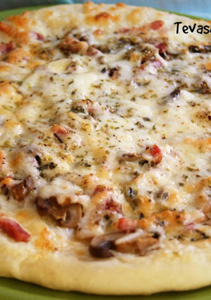 Una foto de Pizza carbonara