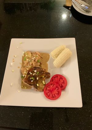 A picture of Pork Chops and Scalloped Potatoes.