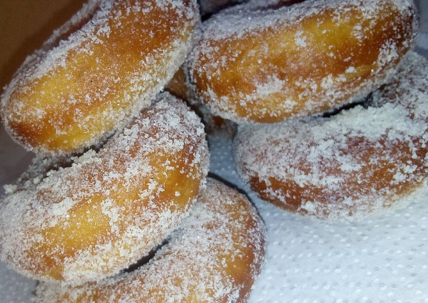Sugar and milk coated doughnuts