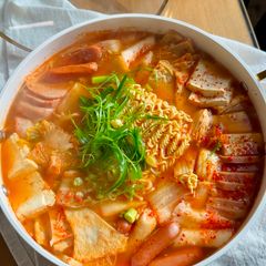 A picture of Kimchi Army Stew (Budae Jjigae).