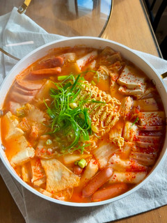 A picture of Kimchi Army Stew (Budae Jjigae).