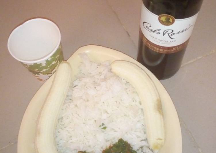 White rice with vegetable sauce and banana