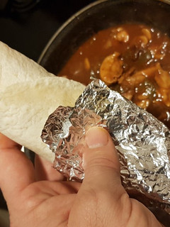 Una foto de Fajitas de muslo de Pollo con Cebolla, Pimiento y Champiñones