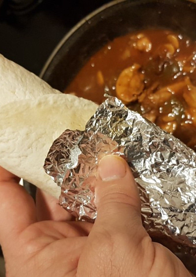 Una foto de Fajitas de muslo de Pollo con Cebolla, Pimiento y Champiñones