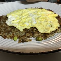 A picture of Fried Rice and Lentil Pie.