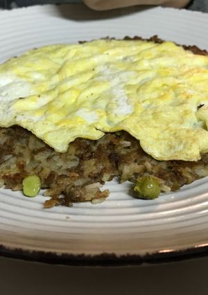 A picture of Fried Rice and Lentil Pie.