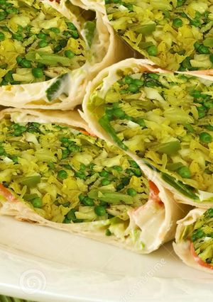 A picture of Stir fried Cabbage, green peas, bok choy stuffed Pita bread.