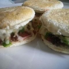 A picture of Minced meat and cheese bread burger.