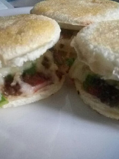 A picture of Minced meat and cheese bread burger.