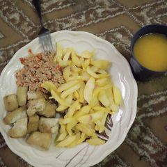 A picture of Chips & Awara with egg sauce.