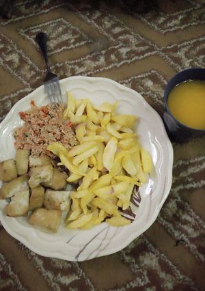 A picture of Chips & Awara with egg sauce.