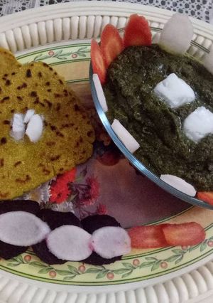 A picture of Sarso Ka saag with makki ki roti.