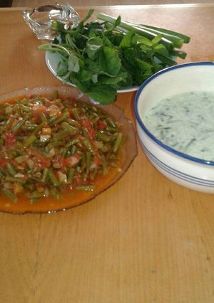 صورة لوصفة فاصولياء مع البندورة😍