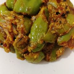 A picture of Green chilli in curd.