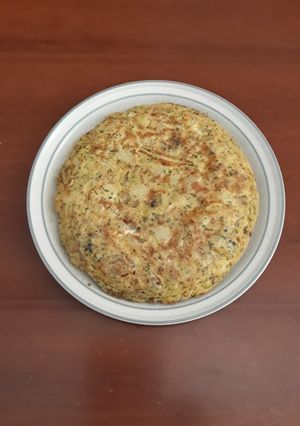Foto principal de Tortilla de patata, ajo y perejil