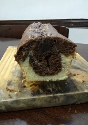 Una foto de Budín marmolado de naranja y chocolate
