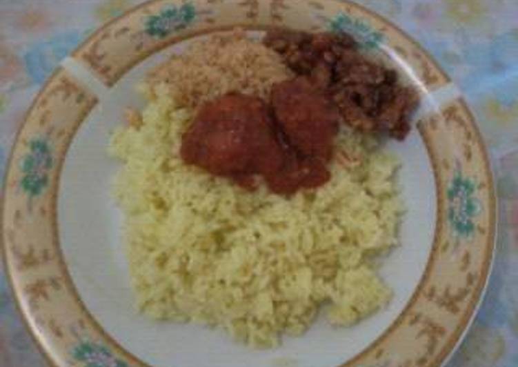 Nasi kuning with masak merah ikan haruan/gabus