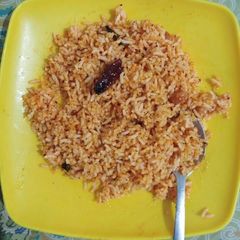 Kempu Chitranna/Red Lemon Rice A picture of Kempu Chitranna/Red Lemon Rice.