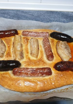 Una foto de Torta salada con embutidos