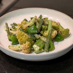 A picture of Stir fried greens with herbs.
