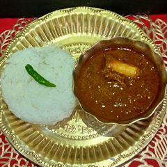 A picture of Manshor Jhol / Mutton Bhat.