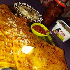 A picture of Butter pan cheese curd paratha.