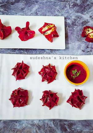 A picture of Beetroot Cheesy-Paneer Momos.