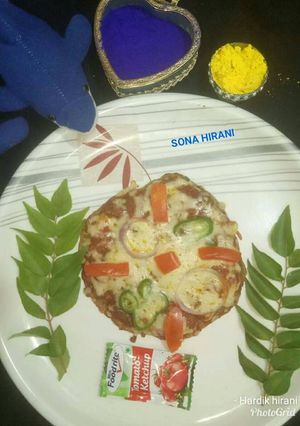 A picture of Green moong pizza.