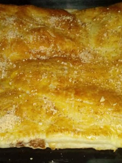 Una foto de Empanada de natillas
